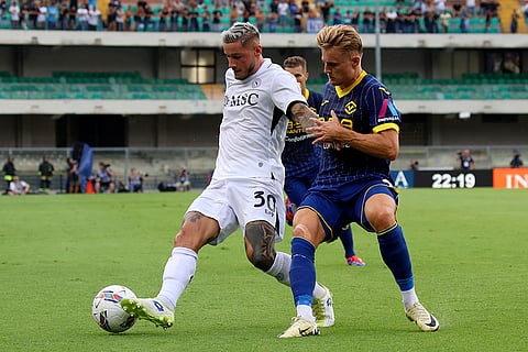 Serie A, Napoli vs Hellas Verona: Napoli's Pasquale Mazzocchi and Hellas Verona's Martin Frese in action during a Serie A match